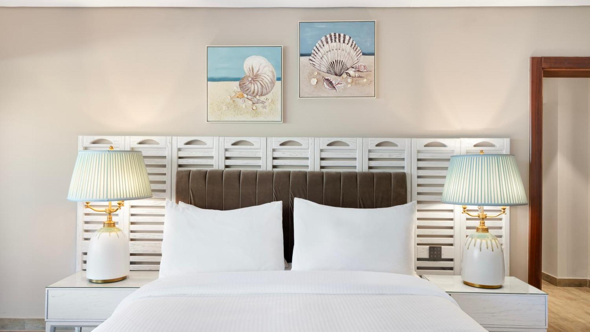 Rixos Premium Alamein El Alamein Room photo A bedroom at Hilton Garden Inn